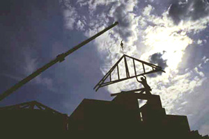 picture of crane moving roof truss